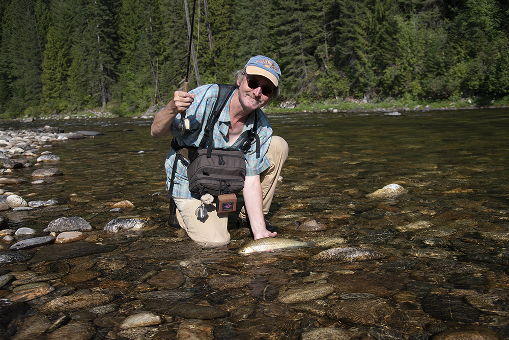 The author gets ready to release a fine westslope cutthroat, the native trout that draws anglers to Kelly Creek.